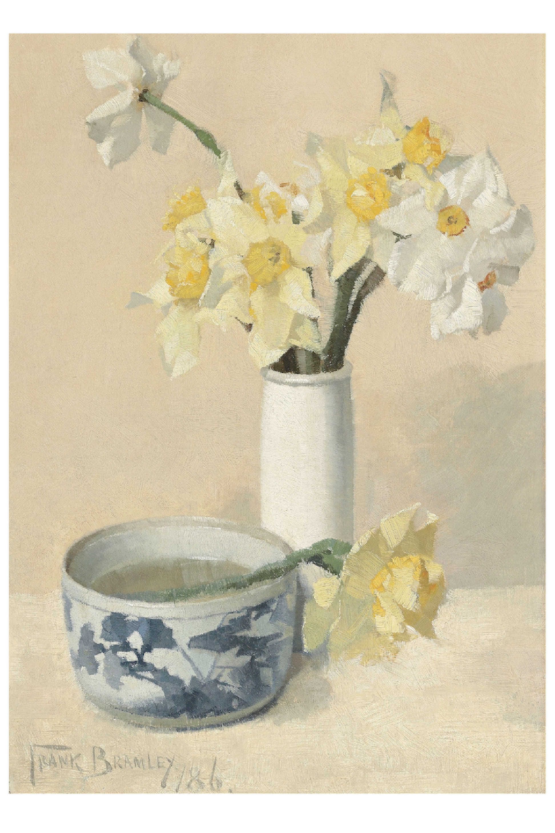 Daffodils in a vase and a patterned bowl.