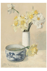 Daffodils in a vase and a patterned bowl.
