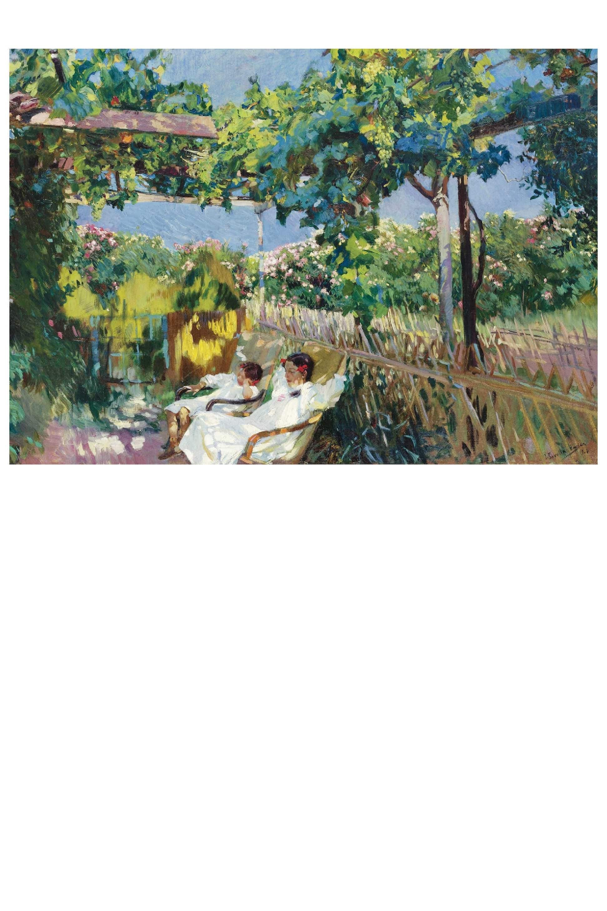 Two people sitting under a trellis of vines.