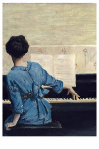 Woman in blue playing piano.