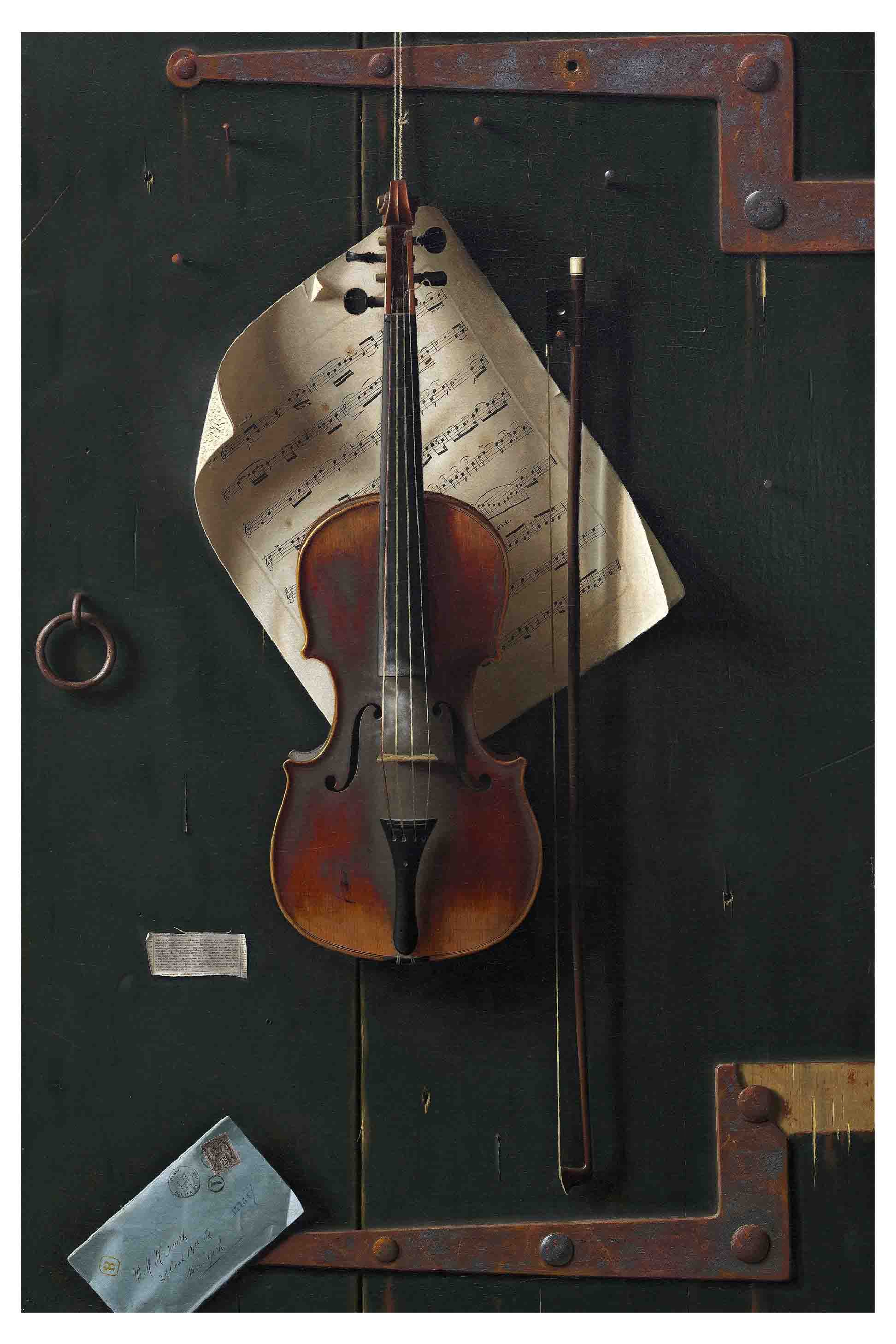 Violin hanging on a green door with sheet music and a bow.