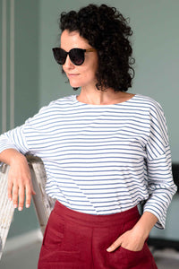 woman in striped shirt and sunglasses