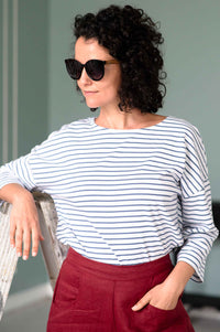 woman in striped shirt and sunglasses