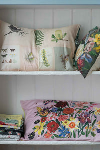 Floral and botanical print pillows on shelf - DSC4823-2