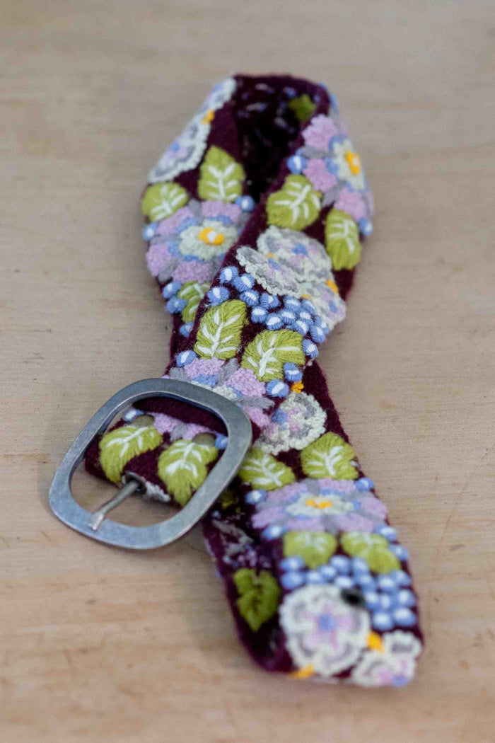 Embroidered floral belt with silver buckle