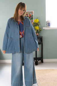 Woman in Dinah Jacket and Hetti Top with Ollie Denim outfit