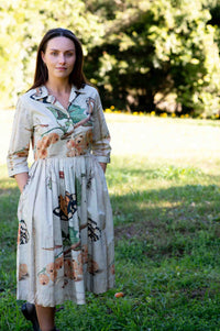 Gianna in insect print dress outdoors
