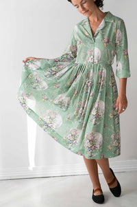 Gianna Newlyn in floral green dress