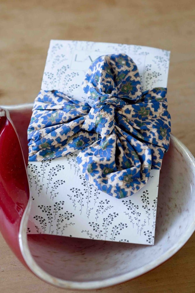 Bluebell floral wrapped gift in red dish
