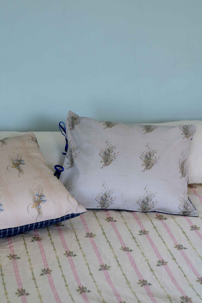 Handwoven cushions with floral design