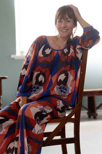 Woman in patterned Hetti top and pants, Ollie composition