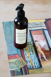 Charlotte's Lab Hydrating Cream Cleanser bottle on art.