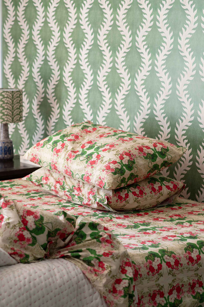 Kantha quilt Pelargonium sheets on bed