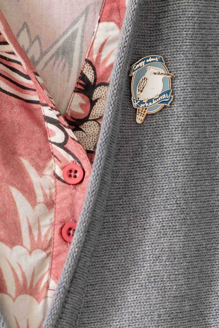 Kookaburra pin on sweater, close-up