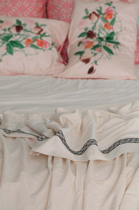 floral pillows & cream bedding