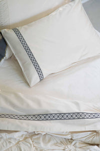 White pillowcase with embroidered trim