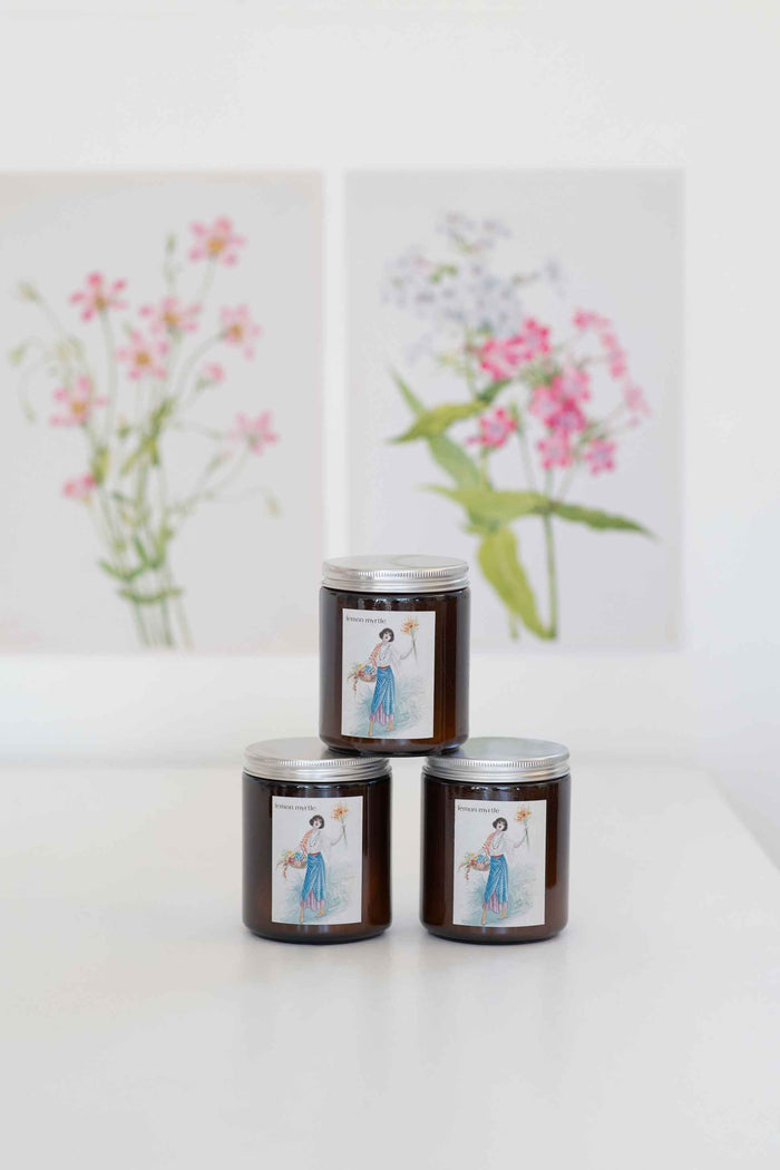 Lemon Myrtle Candle Stack with Floral Background