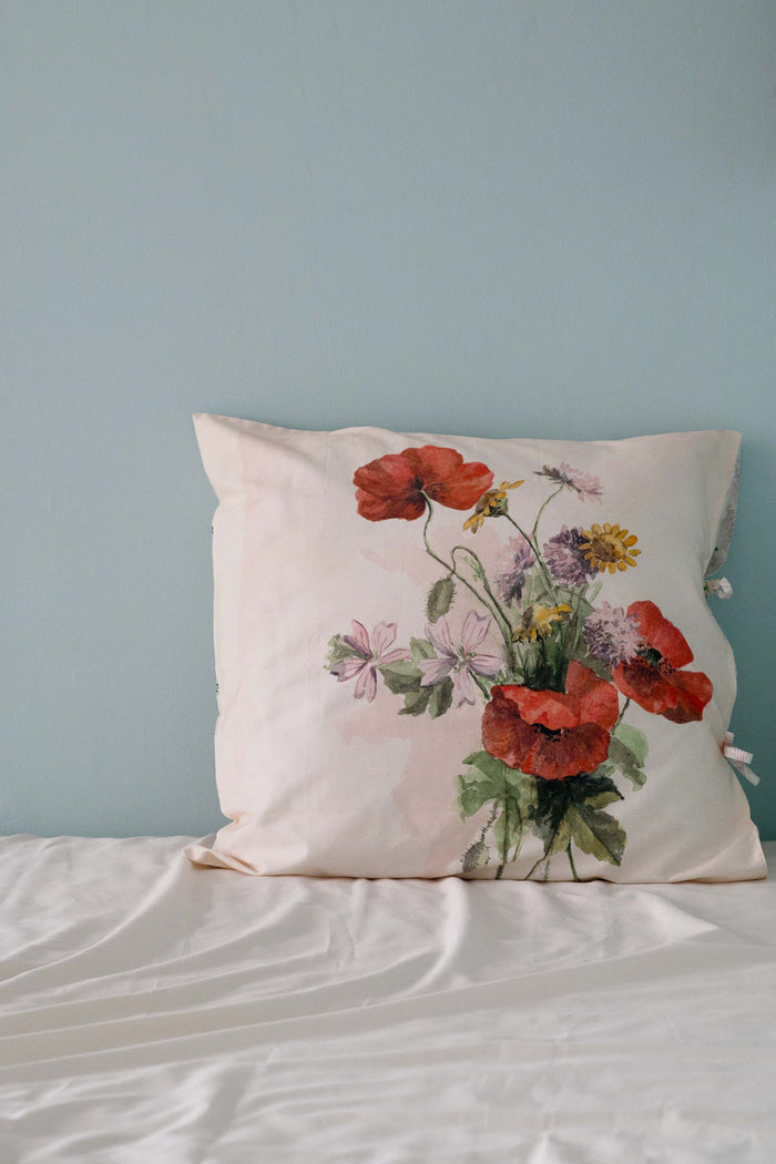 Marietta Euro pillow with floral print on bed
