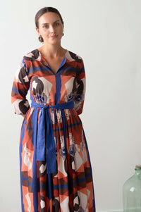 Woman wearing Michaela dress, patterned long dress