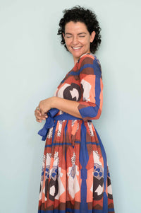 Woman in Michaela dress, smiling