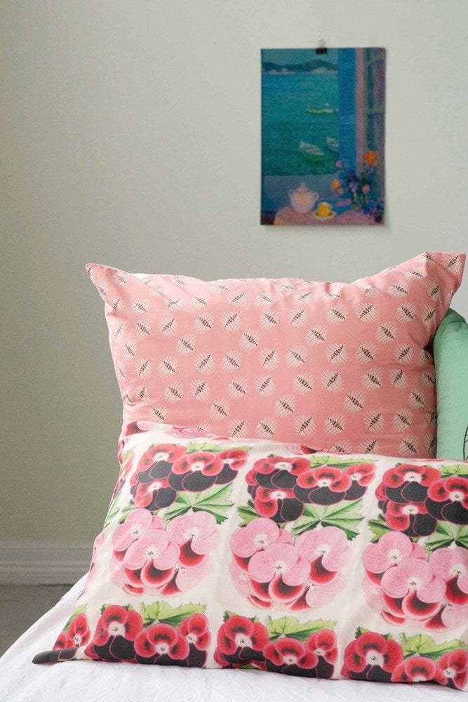 Floral pillows with painting of water and flowers