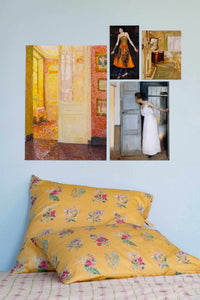 Artwork and pillows in a bedroom