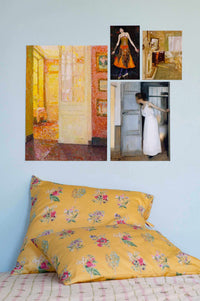 Artwork and pillows in a bedroom