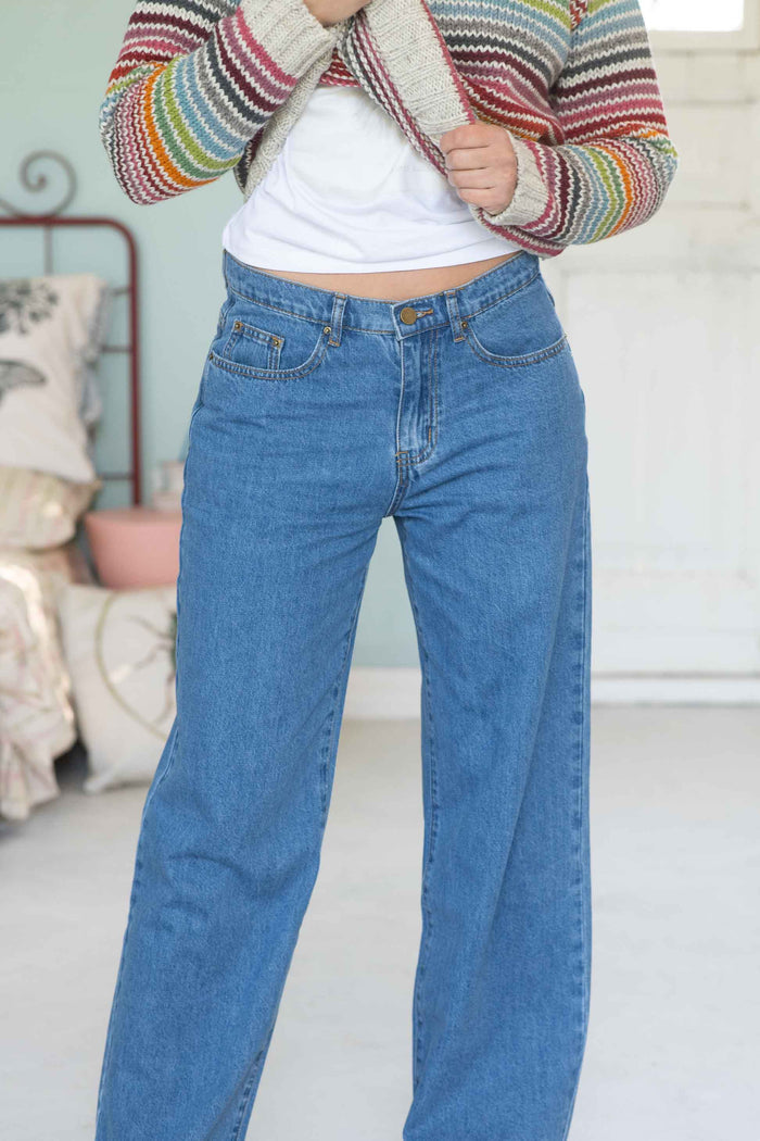NicoJeans light wash denim jeans with striped sweater
