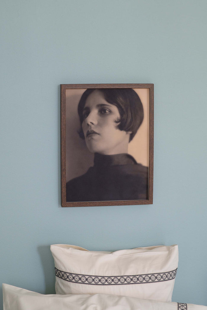 Portrait of Maria LaBelle Sheets on wall