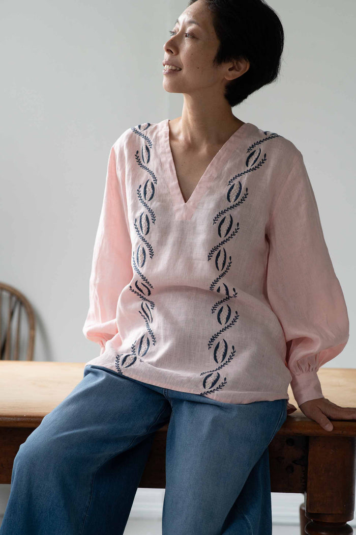 Woman in Simona top & Ollie denim pants