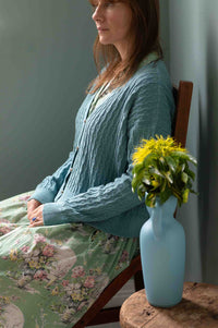 Gianna Newlyn in Sunday Cardigan, with flowers