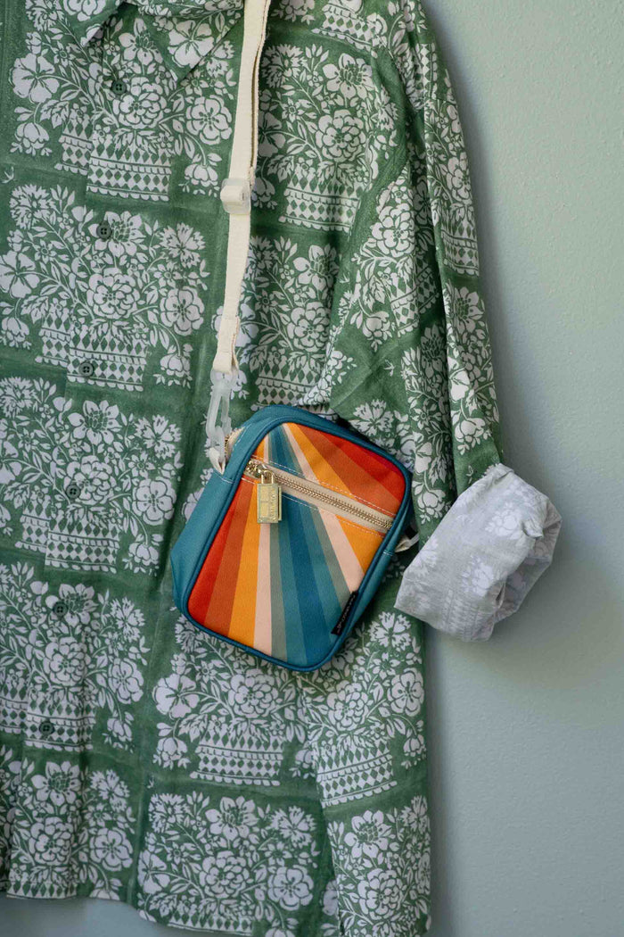 Sunray bag on floral shirt