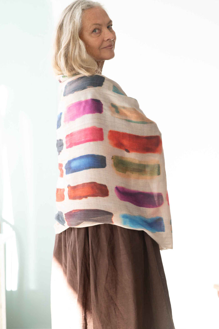 Woman wearing Eliza Chicory swatch scarf