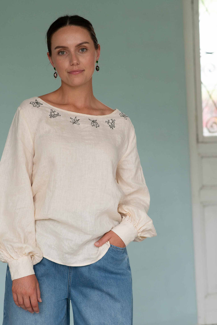 Woman in Valeria Top and denim jeans