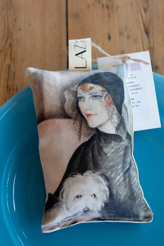 Young woman on scented sachet with dog