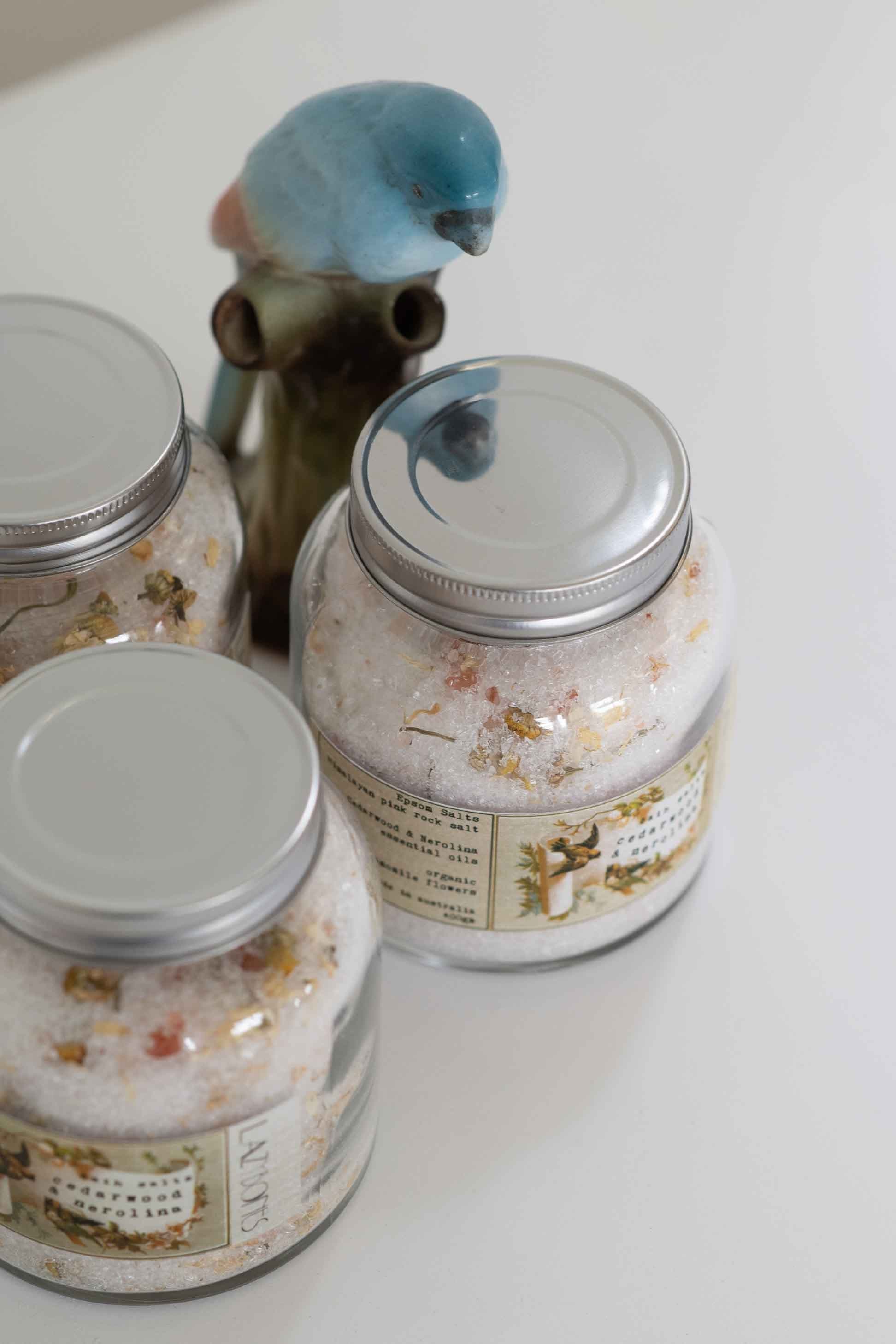 Cedarwood bath salts in jars with bird figurine