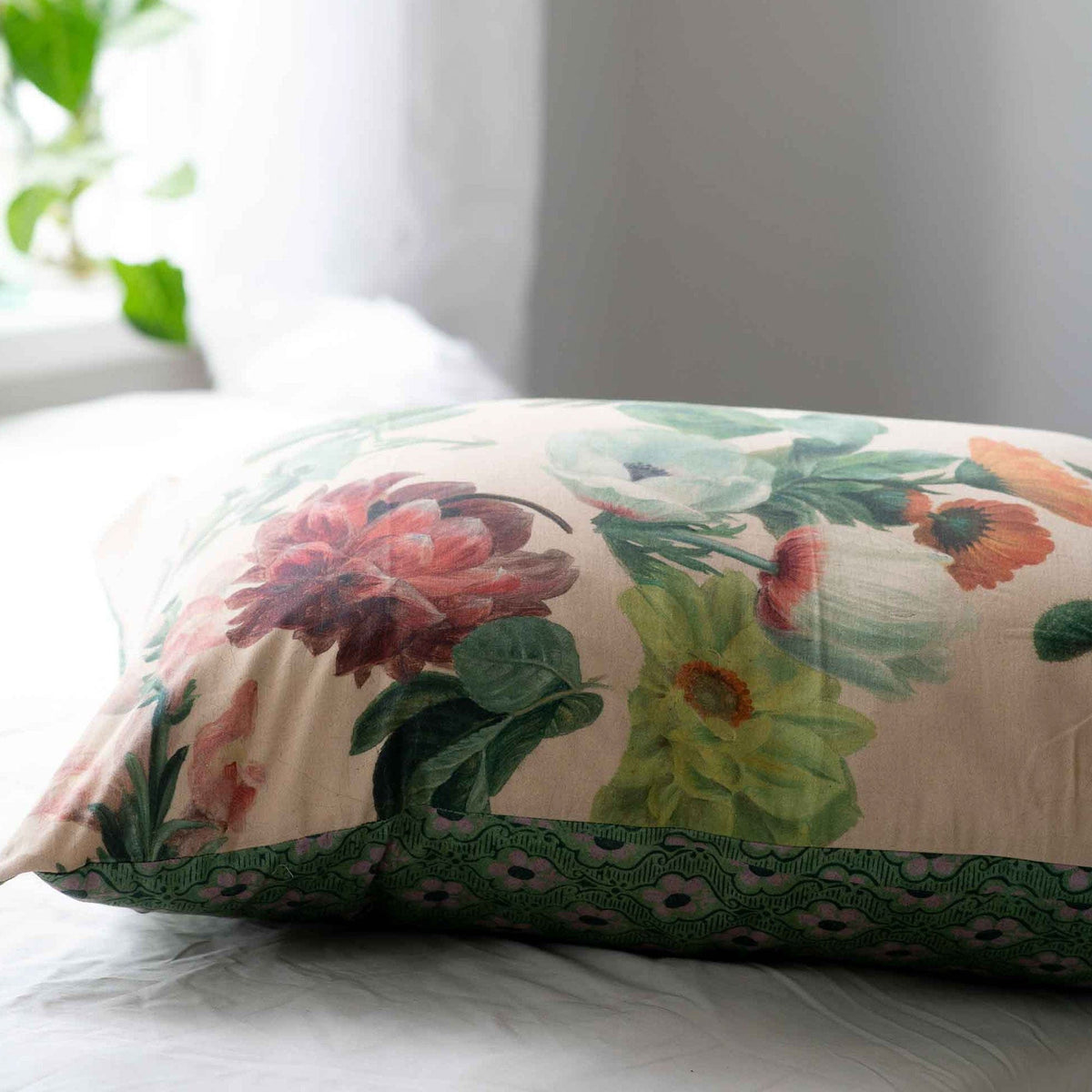 Summer flowers pillow with green lace trim