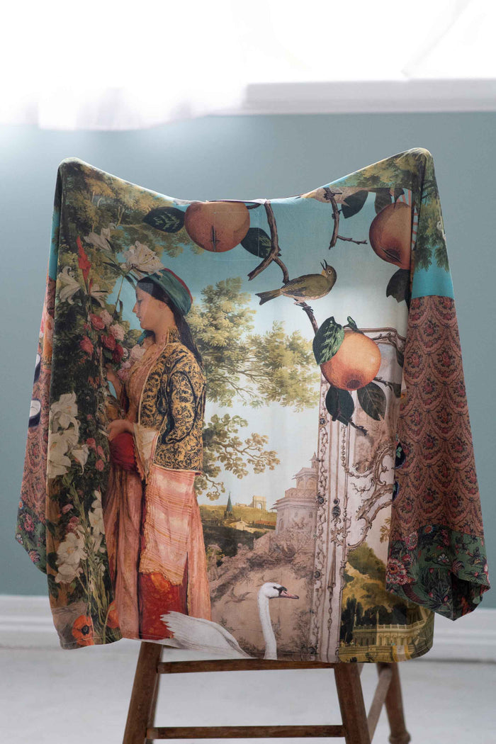 Kimono with a woman in a garden print.