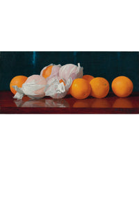 Wrapped oranges on table
