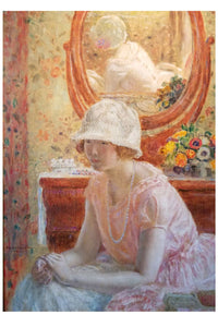 Woman in a pink dress and hat sitting in front of a mirror.