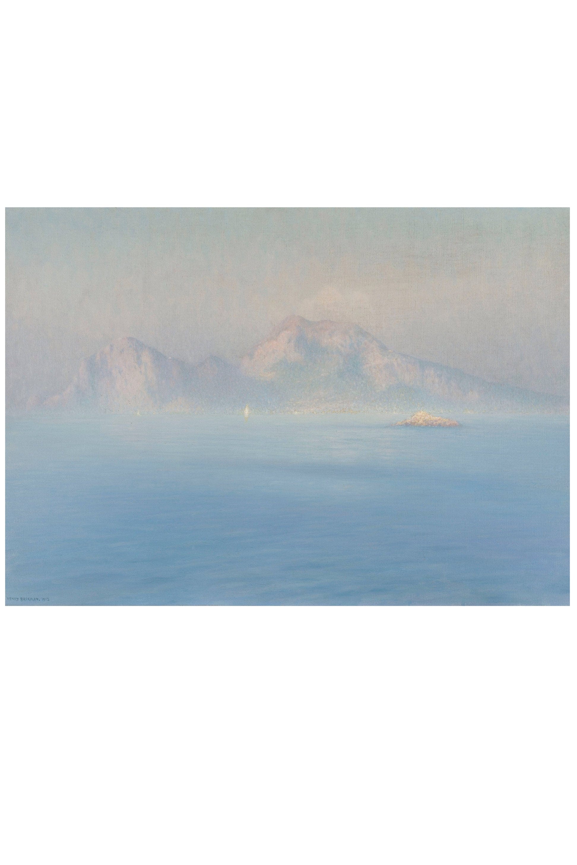 Mountains and sea in a hazy landscape.