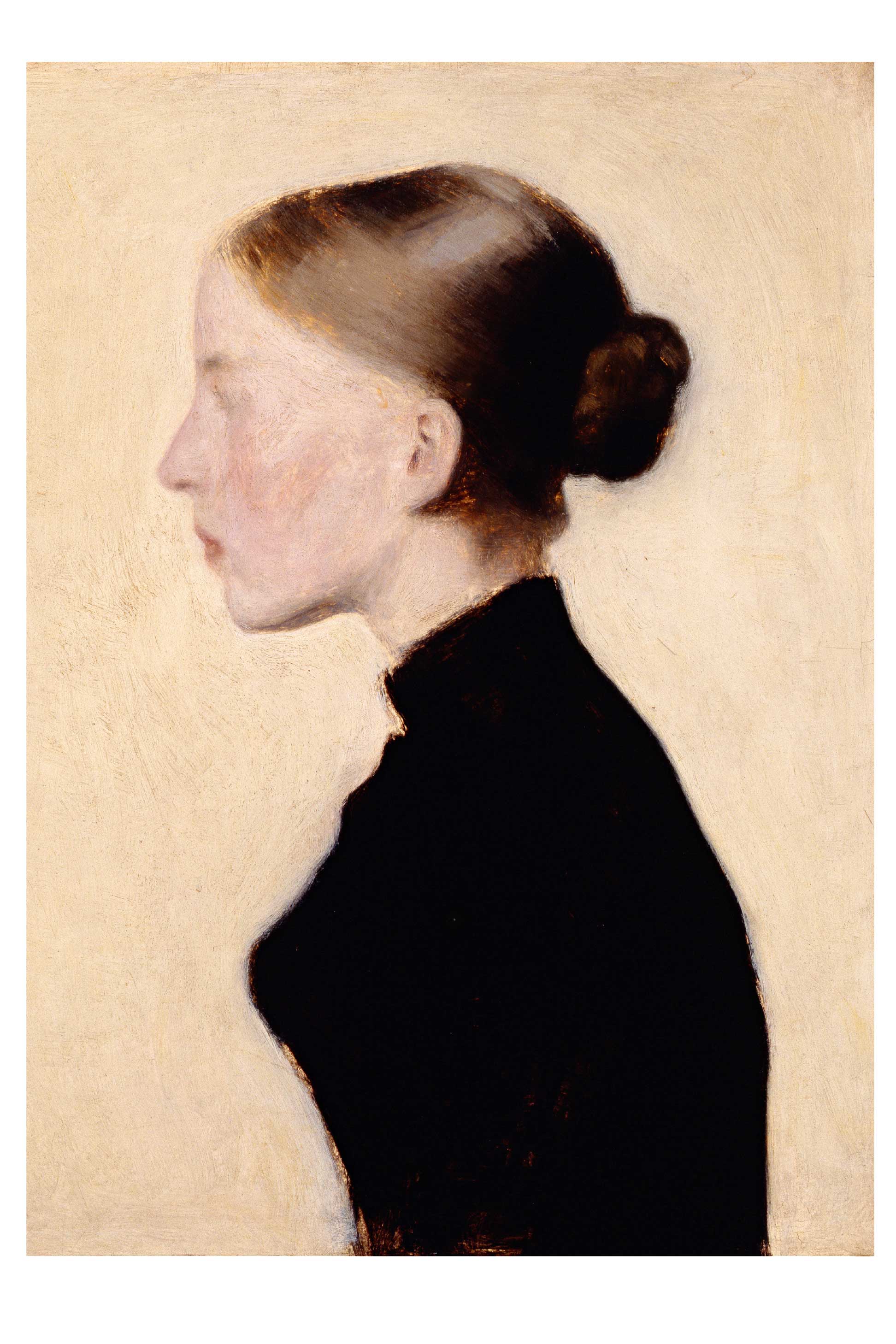 Woman in profile, wearing a black dress.