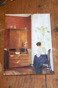 Art print of woman reading by window. DSC4163