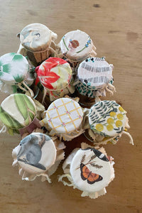 Bath salts jars with decorative fabric lids