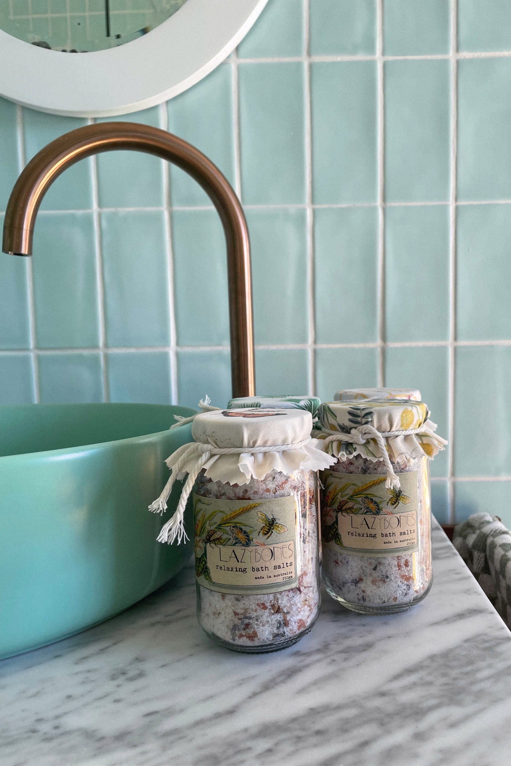 Bath salts jars on bathroom counter