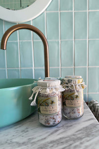 Bath salts jars on bathroom counter