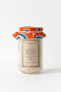 Relaxing mineral bath salts in a jar
