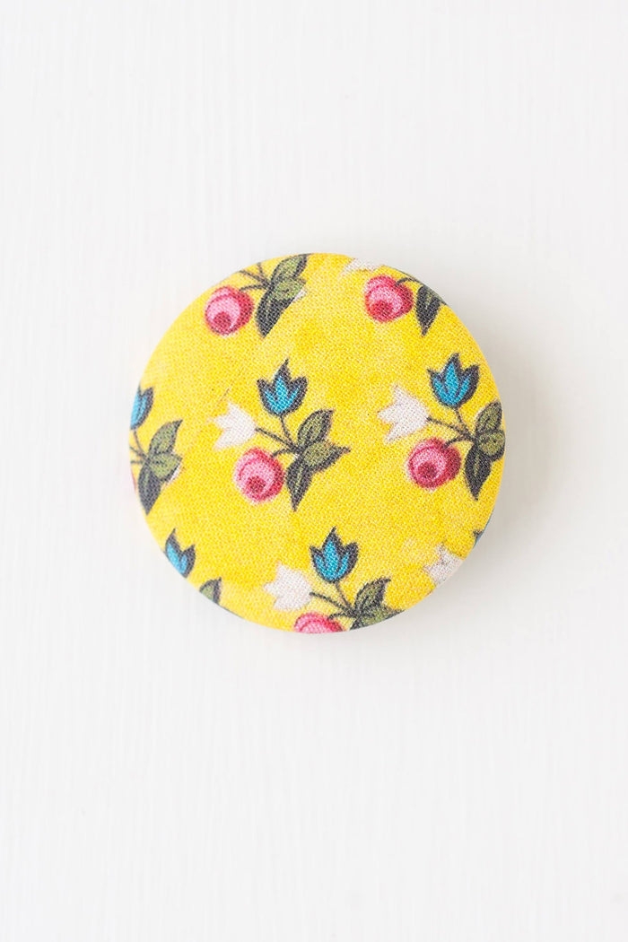 Yellow floral brooch