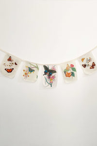 Butterfly garland with floral designs