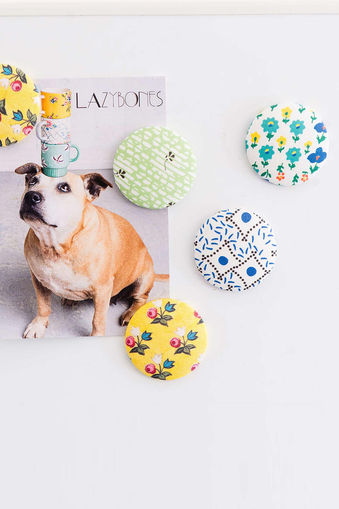 Vintage floral magnet print on fridge with dog